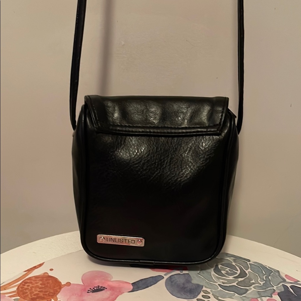 Unlisted Black Handbag with Silver Accent